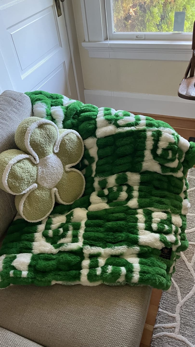 Customer photo review of University of Oregon Ducks Blanket - Hugs