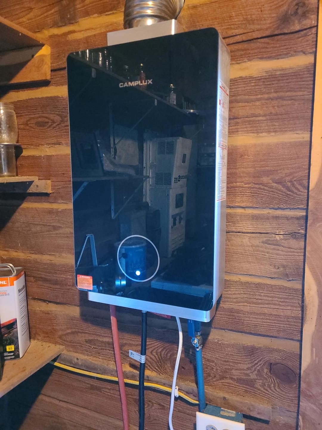 Customer photo review of 3.18 GPM Indoor Tankless Water Heater Propane with Wall Thimble, Black