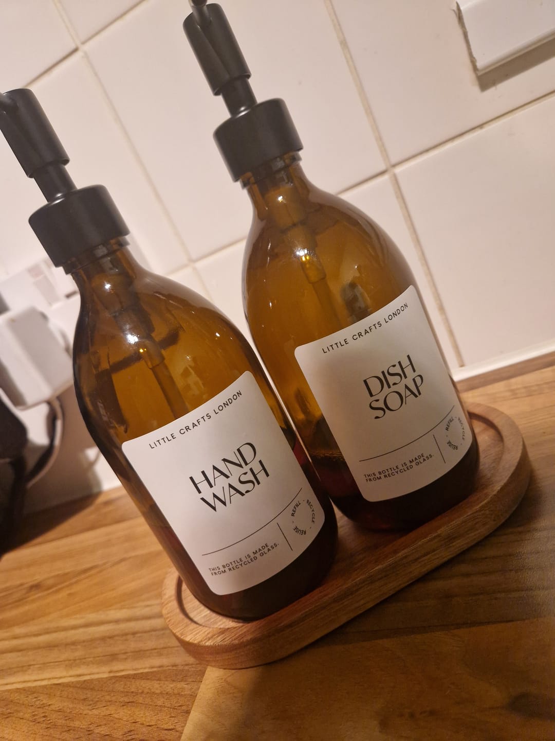 Customer photo review of Set of 2 Amber Glass Bottle 500 ML with Metal Pump & Small Tray