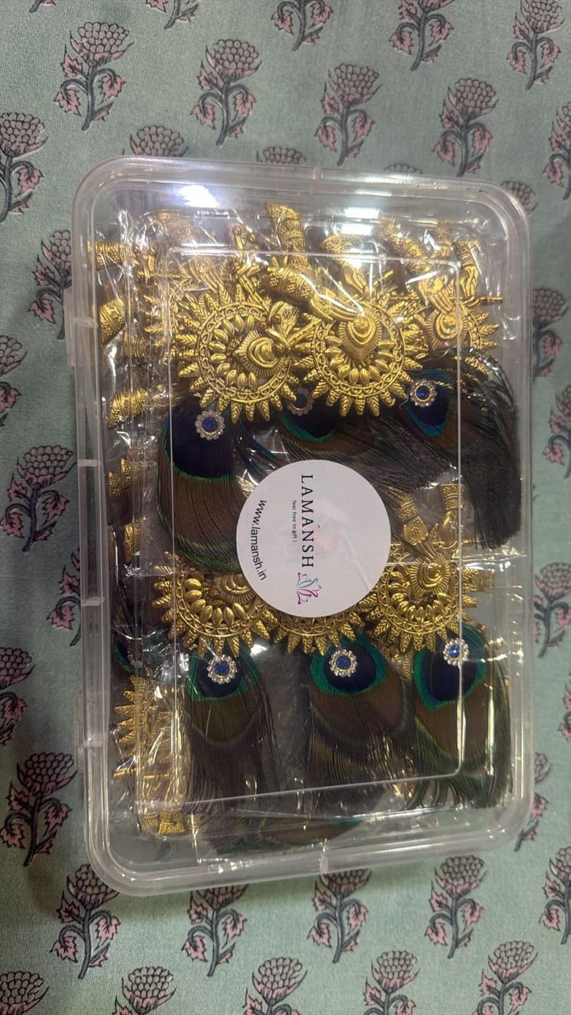 Customer photo review of LAMANSH Metal Designer bansuri brooches with mor pankh 🦚 / Welcome gifts for barati's and guests in weddings and hotels resorts or destination weddings