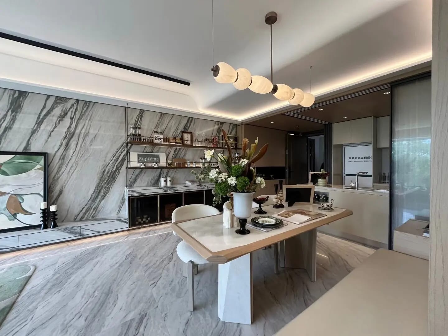 Customer photo review of Modern Natural Alabaster Linear LED Chandelier - Brass & Marble Hanging Pendant Lamp for Dining Table, Kitchen Island & Living Room