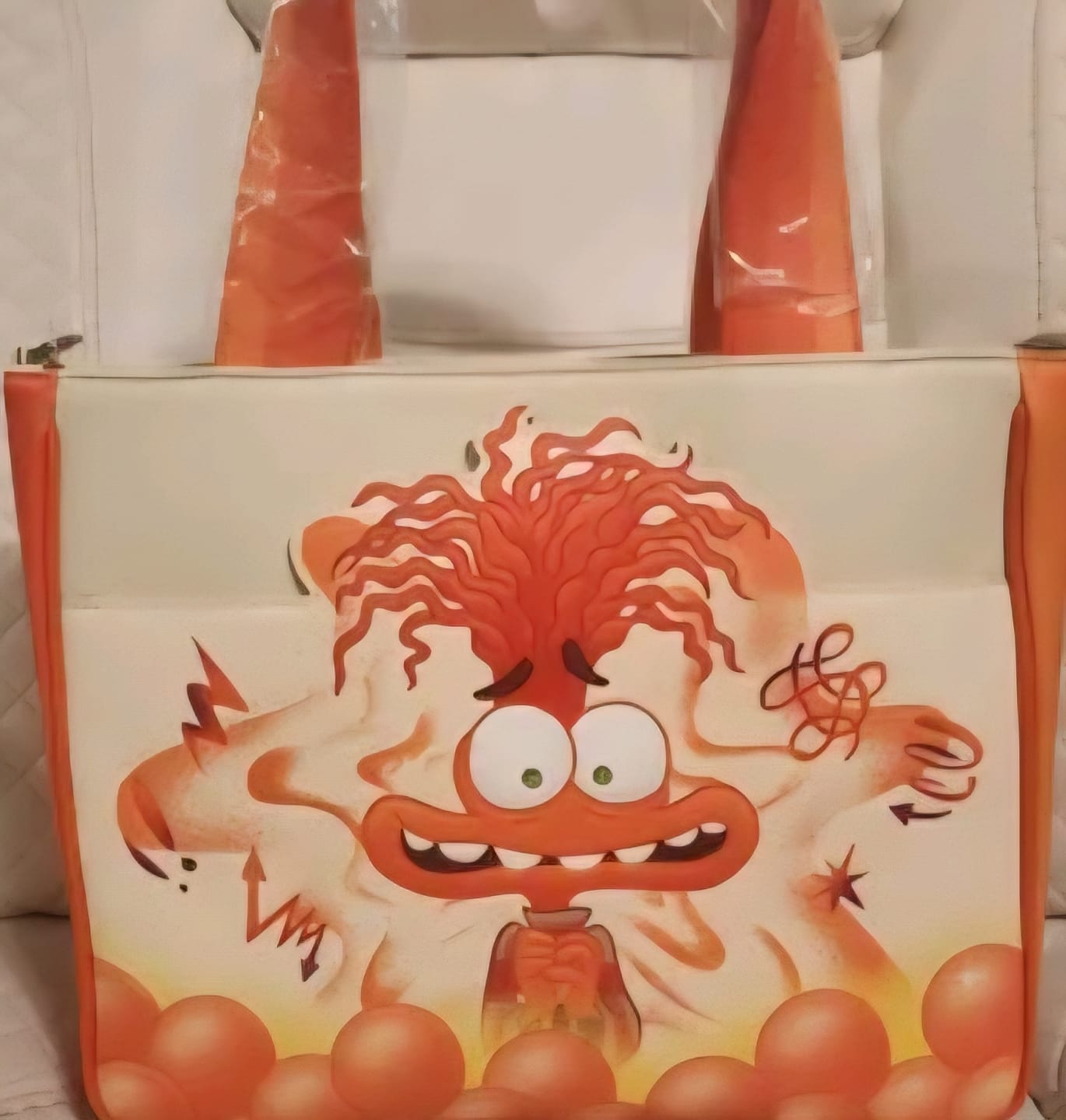Customer photo review of Loungefly Disney Pixar Inside Out 2 Anxiety Glow Tote Bag with Coin Bag