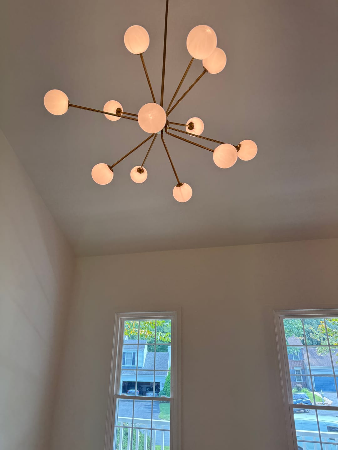Customer photo review of 12-Light Brass Firework Opal Glass Globe Sputnik Chandelier