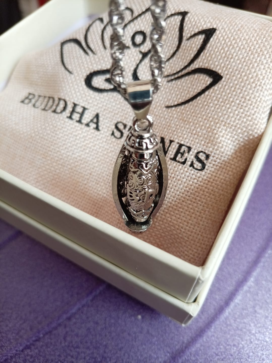 Customer photo review of Buddha Stones Tibet Om Mani Padme Hum Protection Necklace Rotatable Pendant