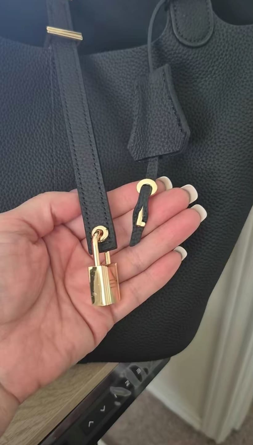 Customer photo review of Kate – Pebbled Leather Lock Handbag