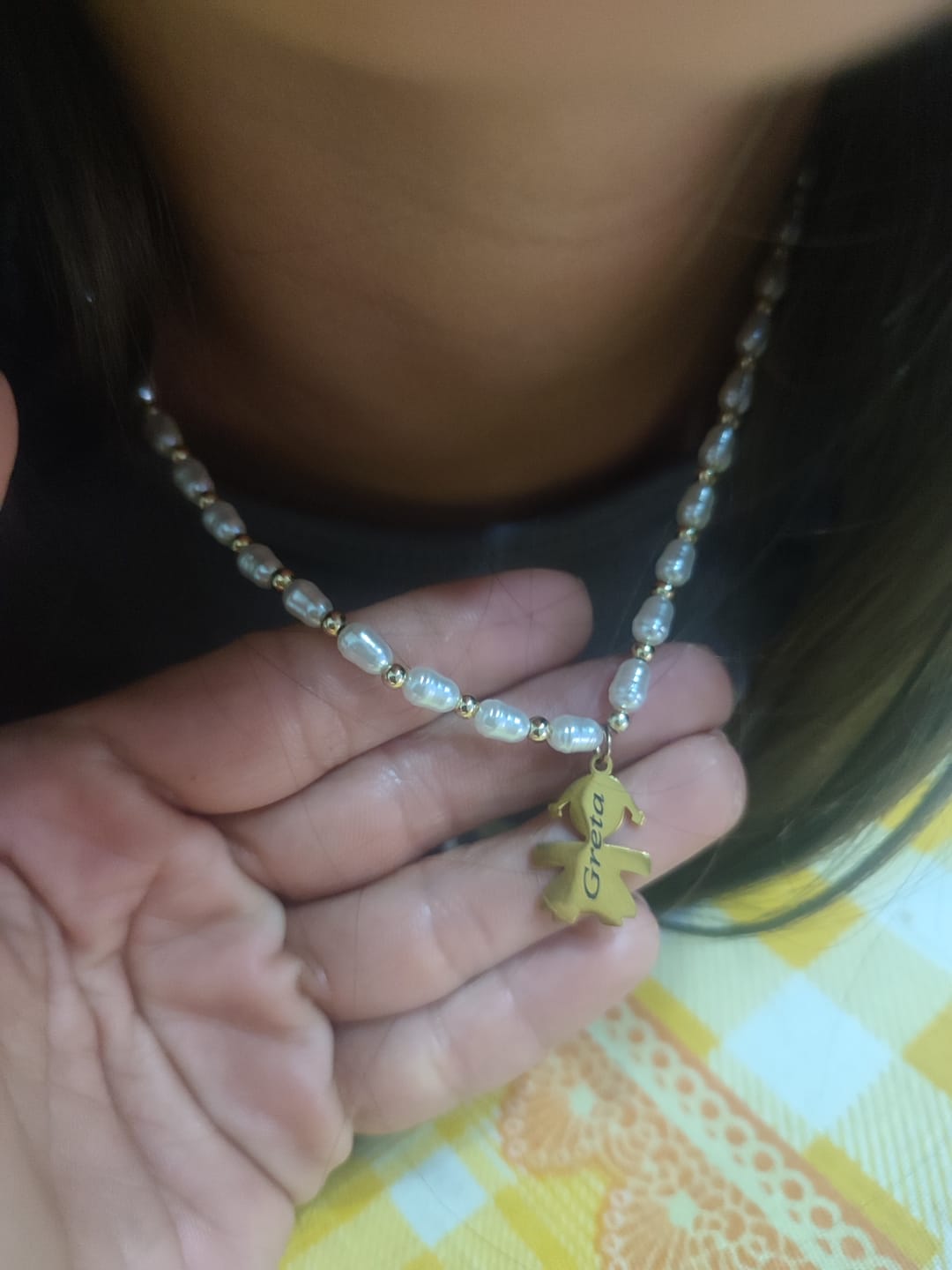 Customer photo review of Girocollo Family In Perle con ciondoli Bimbo Personalizzati