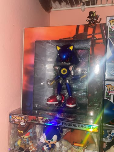 Customer's Modern Metal Sonic 6 inch figure in its original packaging displayed on a shelf.