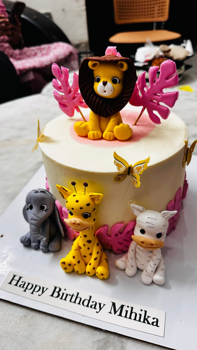Customer photo review of Jungle theme pink Cake