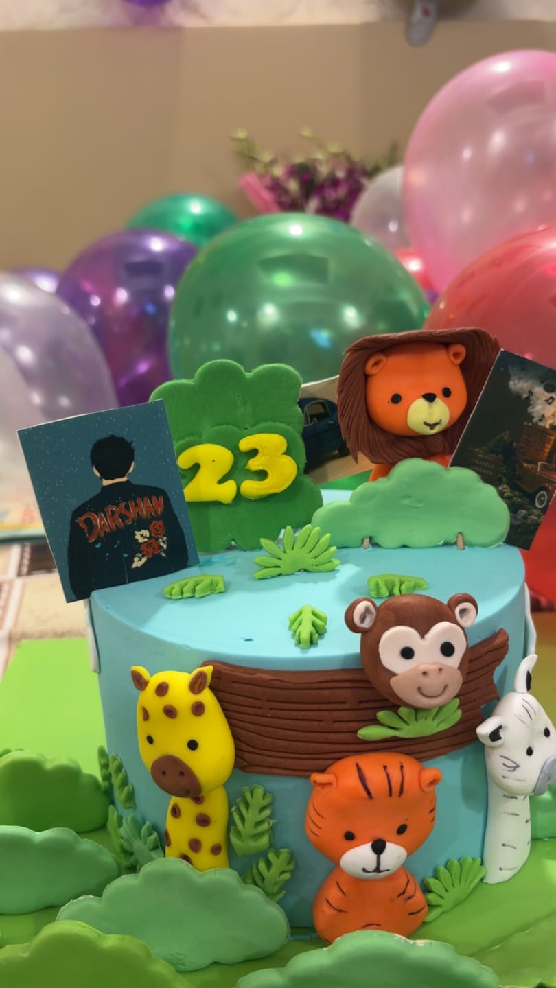 Customer photo review of Jungle Animals First Birthday Cake