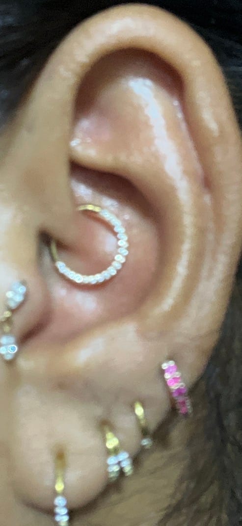 Customer photo review of Piercing Infinity con Zirconias Titanio