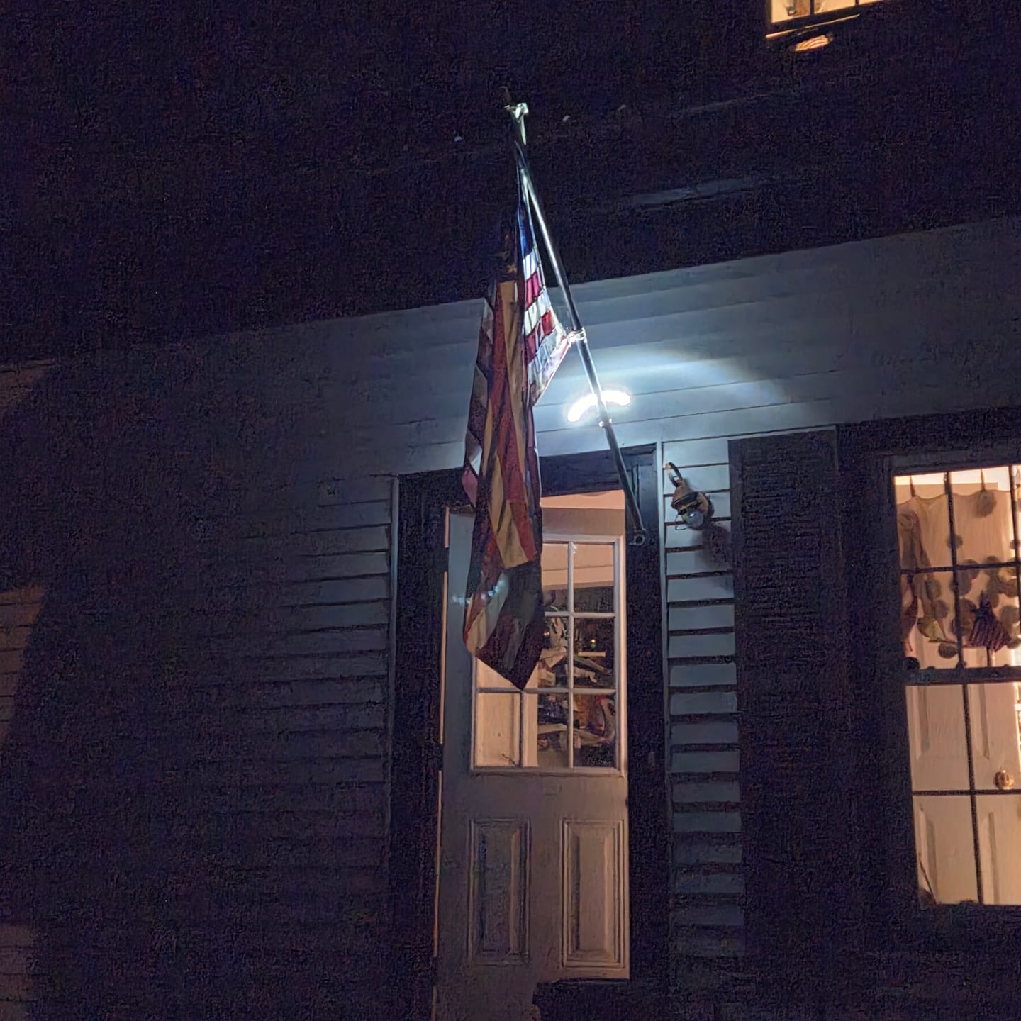 Customer photo review of NEW! Solar Flagpole Light for Wall-Mounted Flagpoles