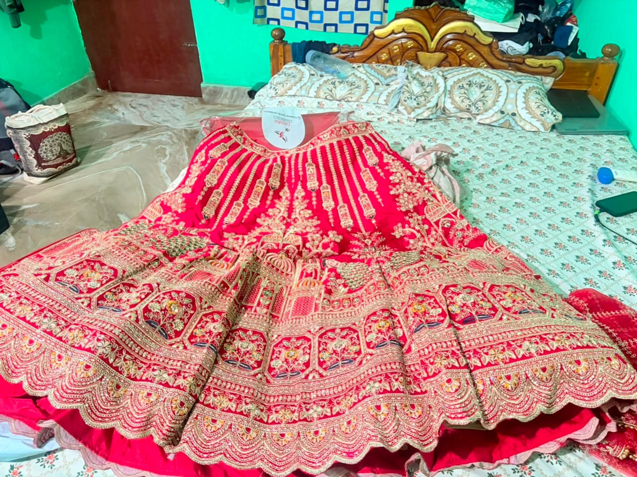 Customer photo review of Signature Style Maroon Royal Zarkan Diamond Work Bridal Lehenga