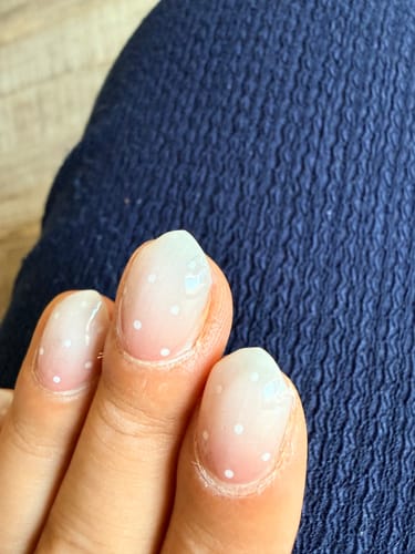 Customer's UV Gel Babyboomer Sprinkles on nails, showing a nude to white gradient with tiny dots
