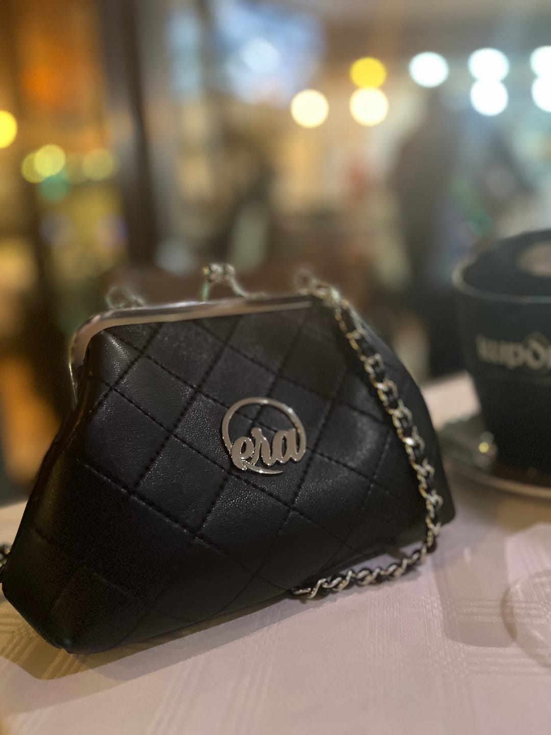 Customer photo review of ERA Mini Kisslock Chain Bag – Black