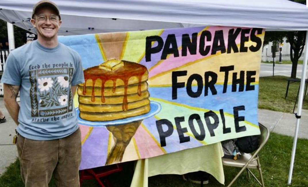 Customer photo review of Feed The People & Starve The Empire Tee