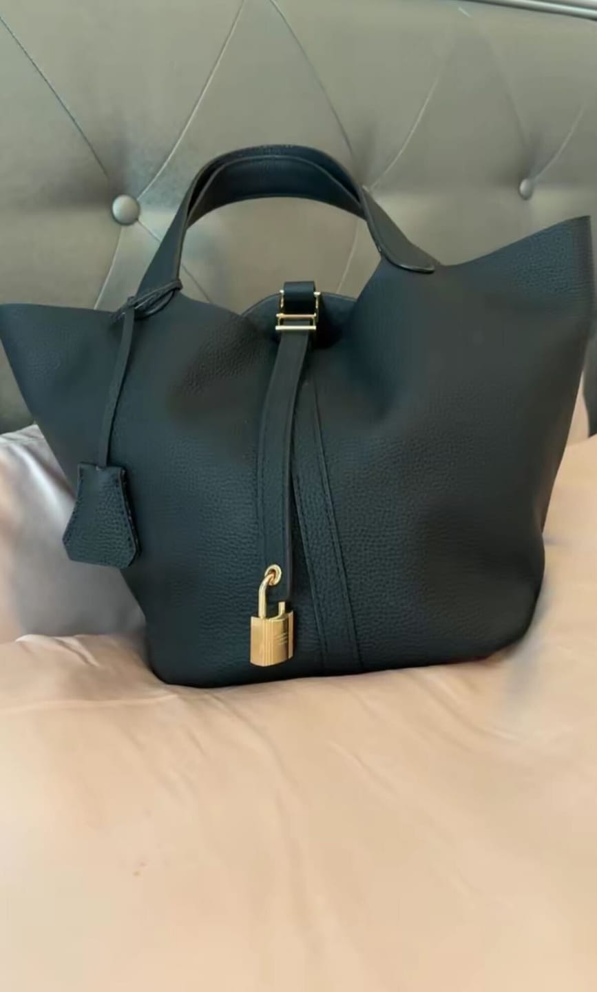 Customer photo review of Kate – Pebbled Leather Lock Handbag