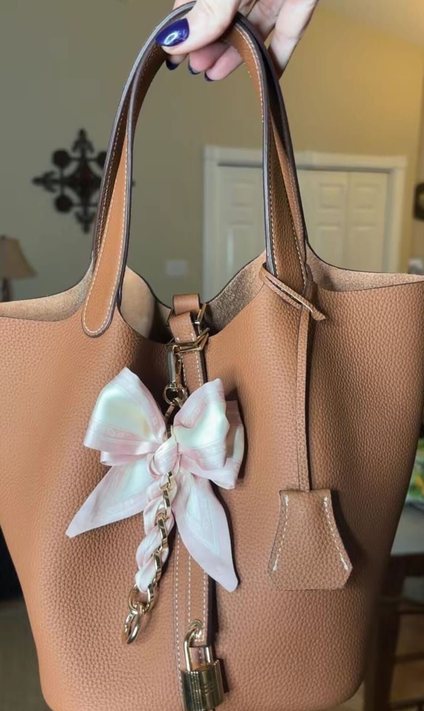Customer photo review of Kate – Pebbled Leather Lock Handbag