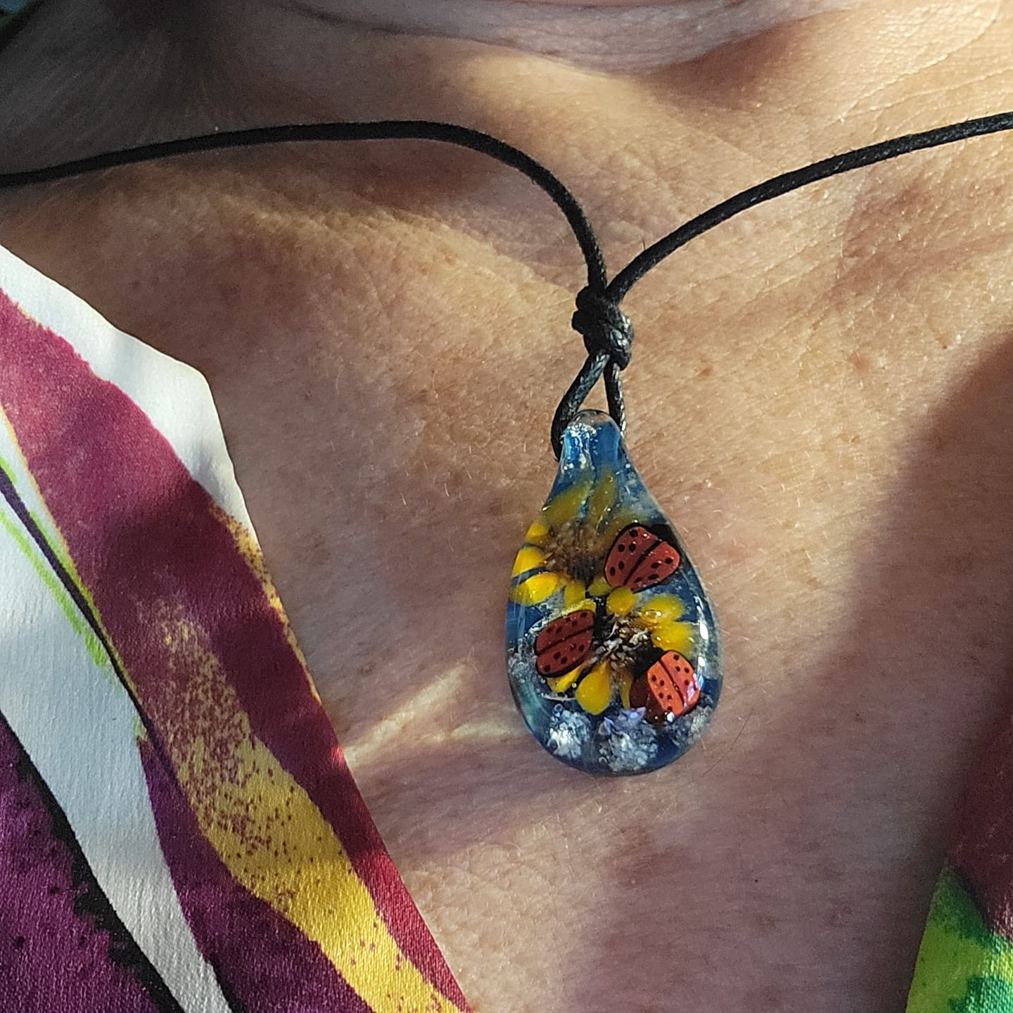 Customer photo review of Ladybug Pendant with Infused Cremation Ashes