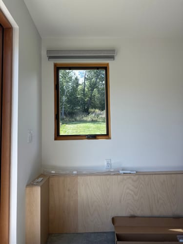 Customer photo review of SmartWings Motorized Light Filtering Roller Shades 70% Blackout Safari