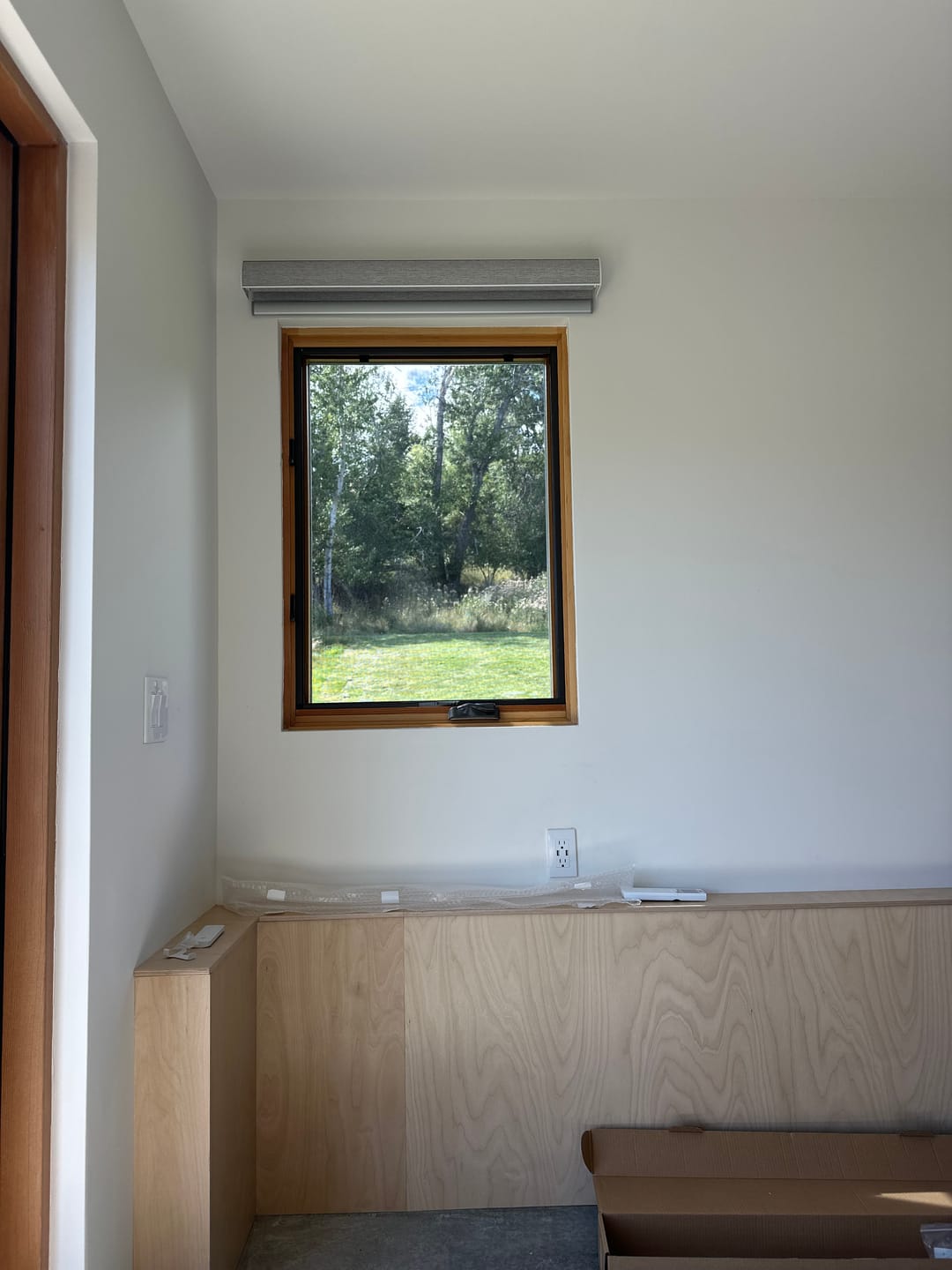 Customer photo review of SmartWings Motorized Light Filtering Roller Shades 70% Blackout Safari
