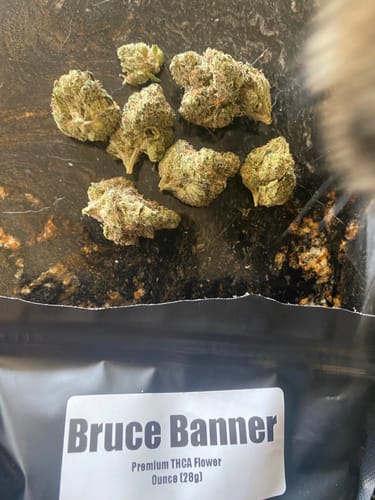 Customer's Bruce Banner THCA flower buds shown in a clear baggie with a labeled package below.
