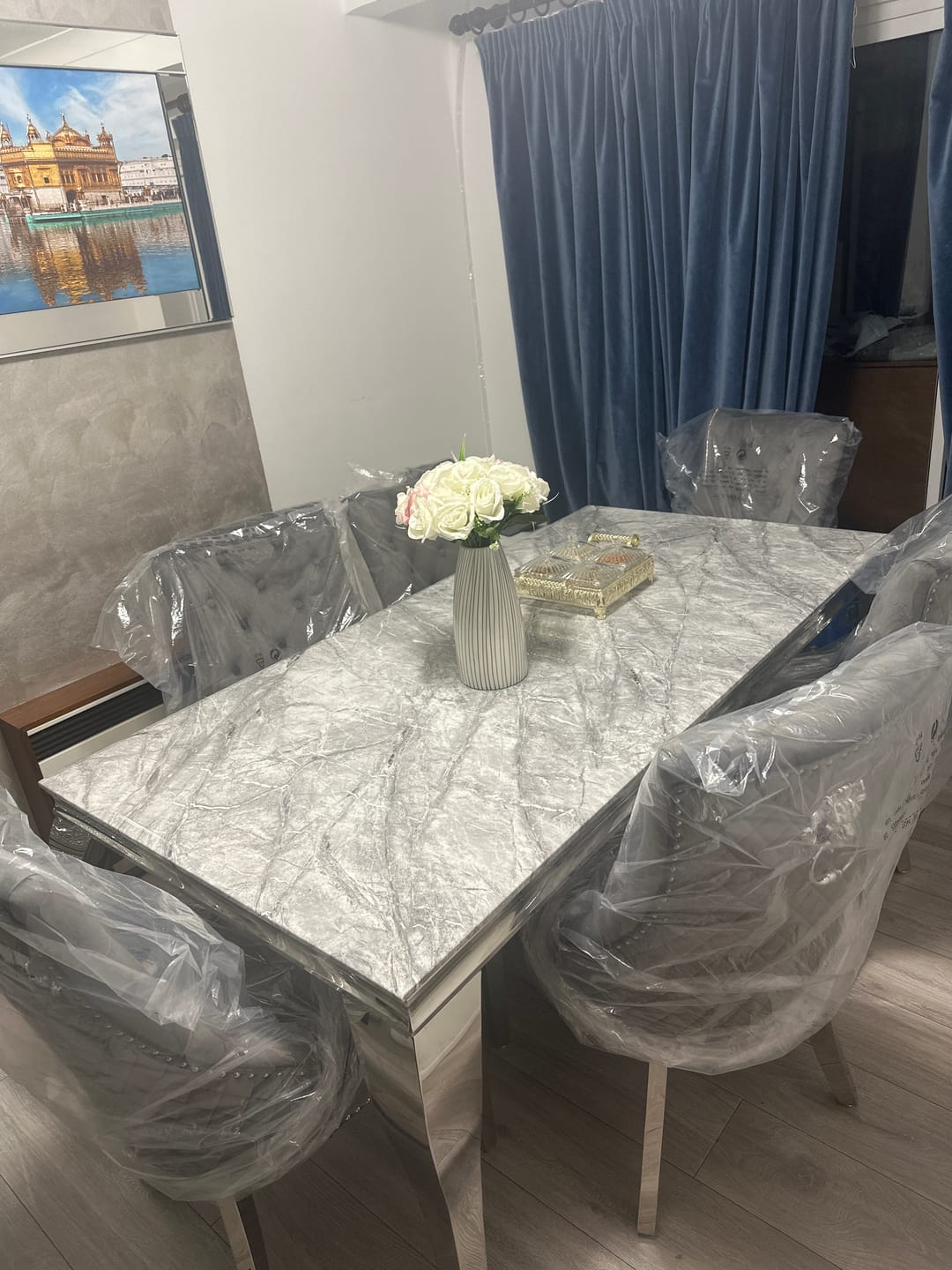 Customer photo review of Vienna Marble Dining Table With Bently Knocker Chairs lion