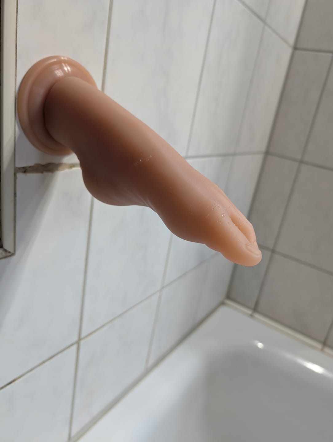 Customer photo review of Realistic Foot-Shaped Dildo with Suction Base