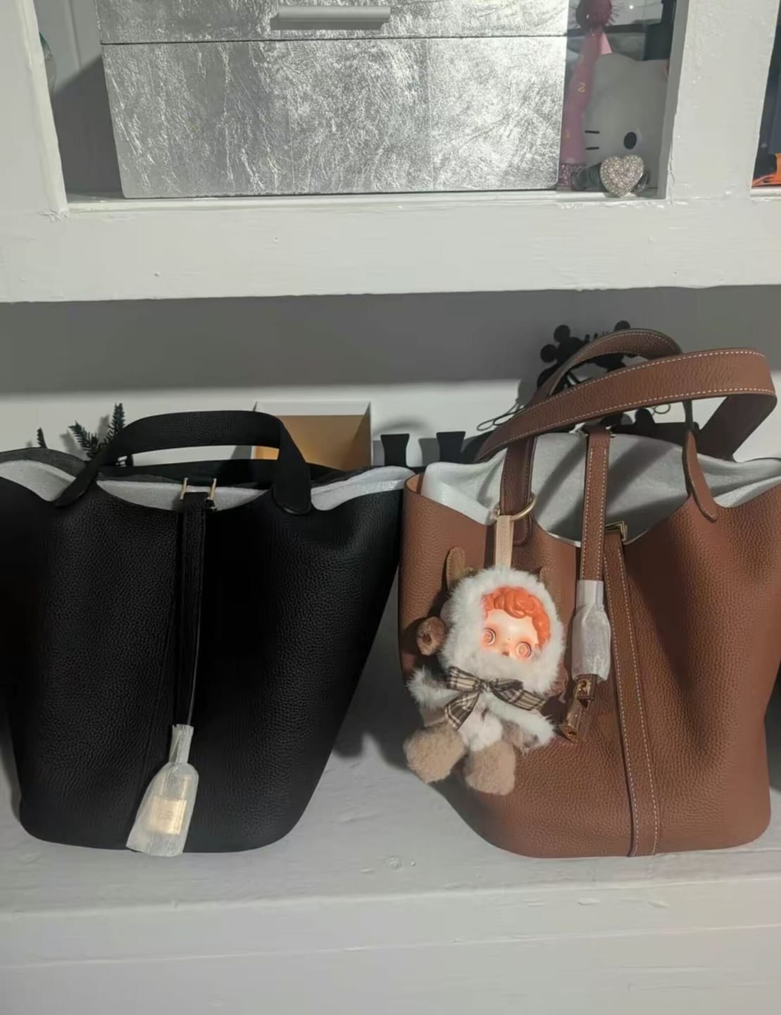 Customer photo review of Kate – Pebbled Leather Lock Handbag