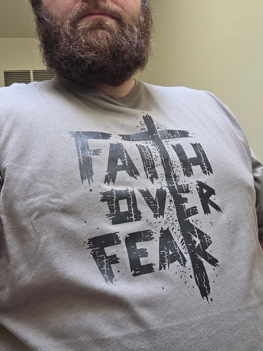 Customer photo review of Faith Over Fear Tee