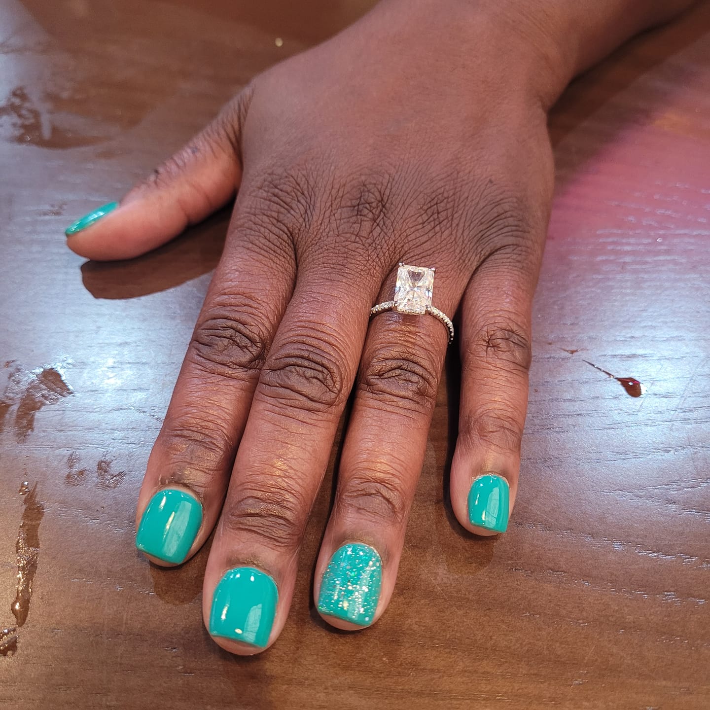 Customer photo review of Darcy 4.5 Carat Radiant Cut Hidden Halo Moissanite Engagement Ring in 10k White Gold