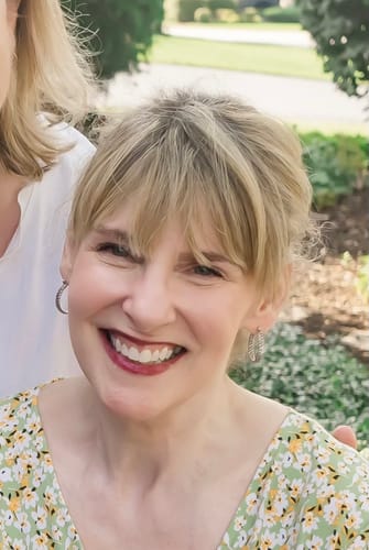 Customer's face in a natural outdoor setting, showing results after using The Micro Infusion System.
