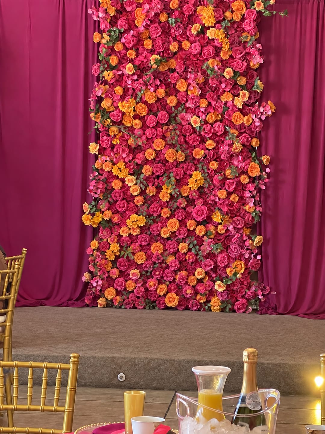 Customer photo review of Vibrant Hot Pink and Orange Rose Flower Wall Backdrop for Weddings & Events