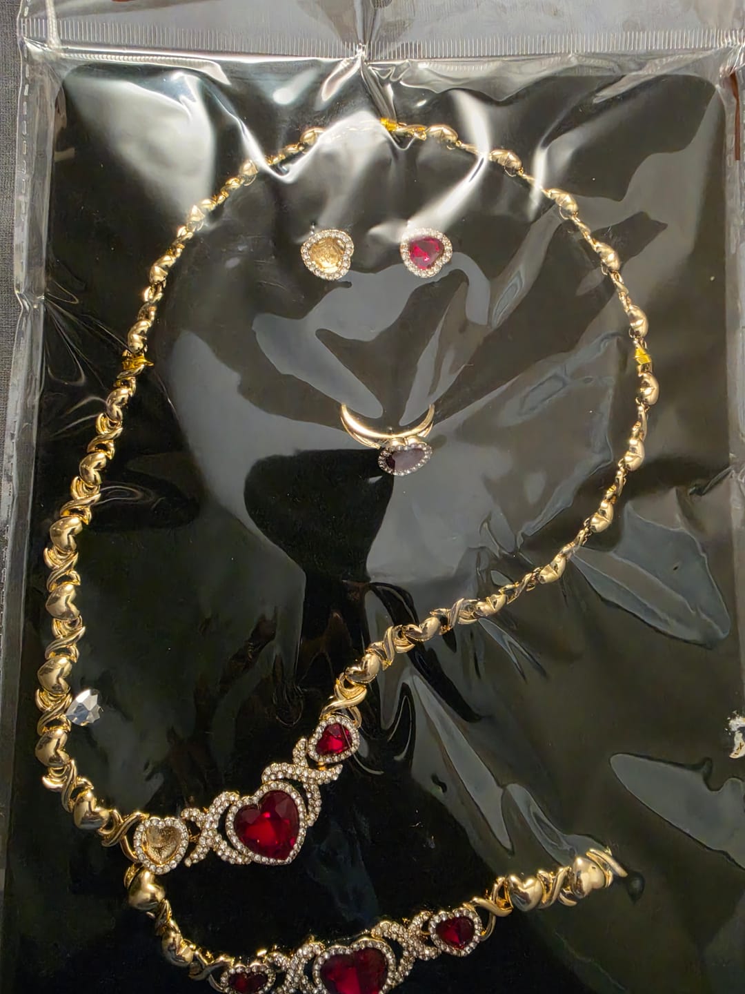 Customer photo review of 18K Gold Filled XOXO Necklace Set For Women | Gold Heart Jewelry Set | 4-pc Gold Ruby Heart Jewelry Set | Ethiopian Gold Ruby Necklace Set | Hugs and Kisses Necklace Set