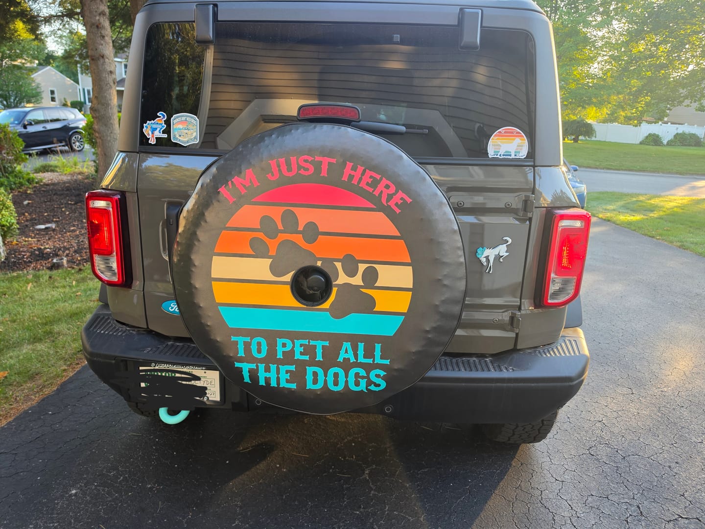 Customer photo review of I'm Just Here To Pet All The Dogs Spare Tire Cover for Jeep, Bronco, RV, Camper, Trailer, & More