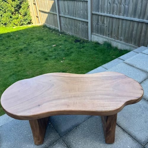 Customer photo review of Unique Solid Wood Coffee Table with Artistic Design and Natural Finish