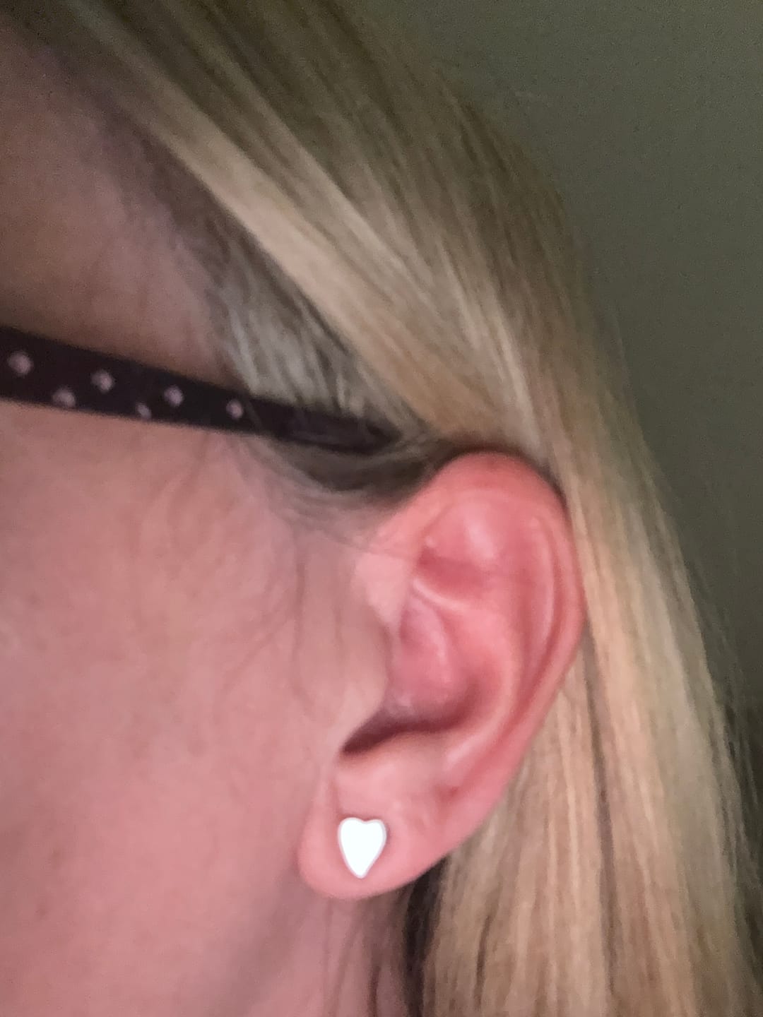 Customer photo review of Amore Twist Heart Stud Earrings