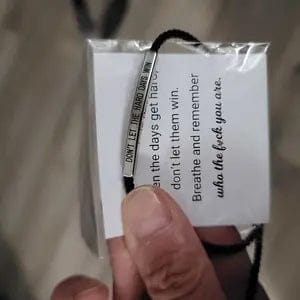 Customer photo review of FuAttract Don't Let The Hard Days Win Stainless Steel Engraved Tube Braided Courage Bracelet