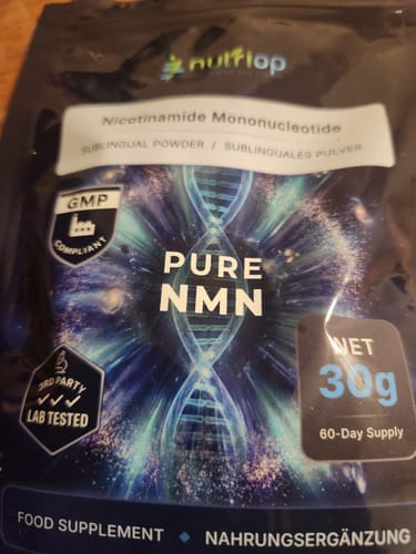Customer's Nutriop Pure NMN sublingual powder packaging showing label with 30g weight and lab-tested badge.