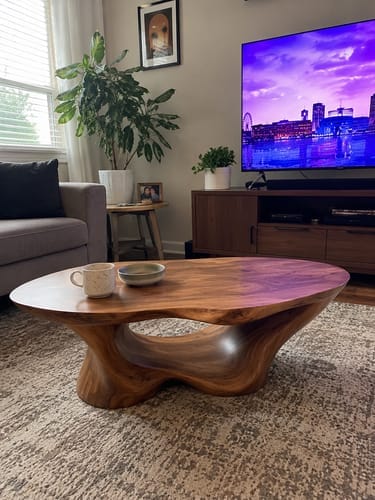Customer photo review of Unique Solid Wood Coffee Table with Artistic Design and Natural Finish