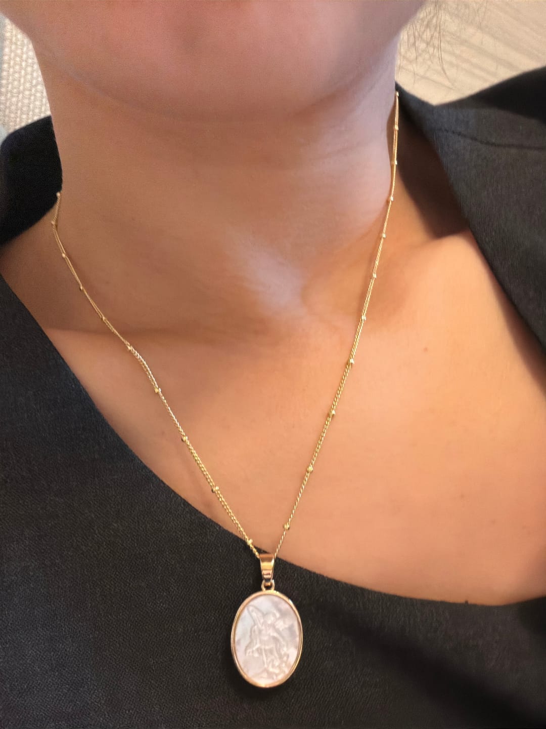 Customer photo review of Christianartworkshop Natural White Pearl Saint Necklace: Sacred Heart, Jesus, Our Lady & St. Michael