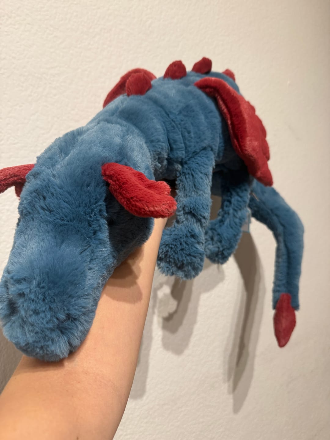 Customer photo review of Dexter Dragon Huge | Jellycat