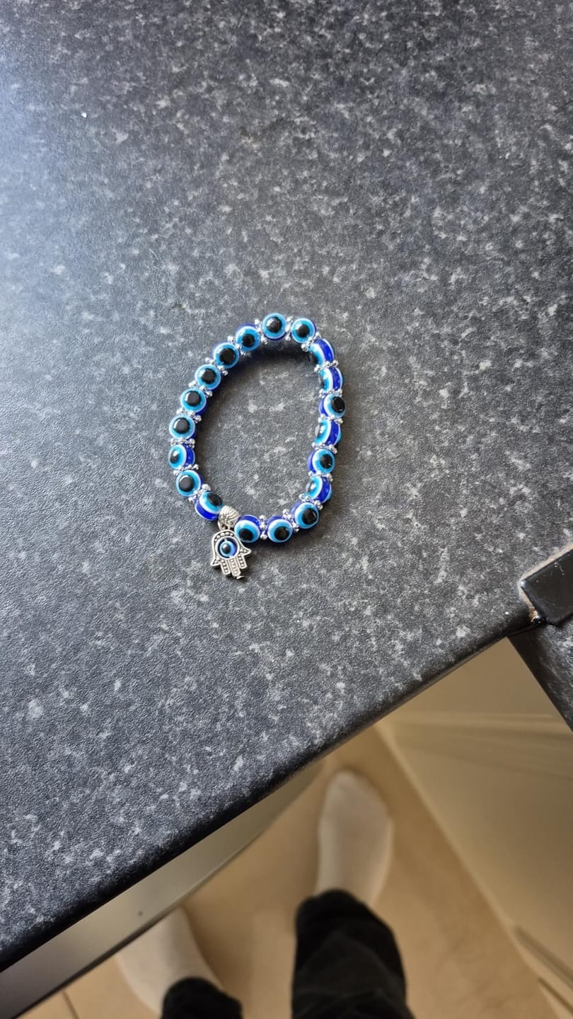 Customer photo review of FuAttract Protection Luck & Balance Hamsa Hand Evil Eye Charm Spiritual Bracelet