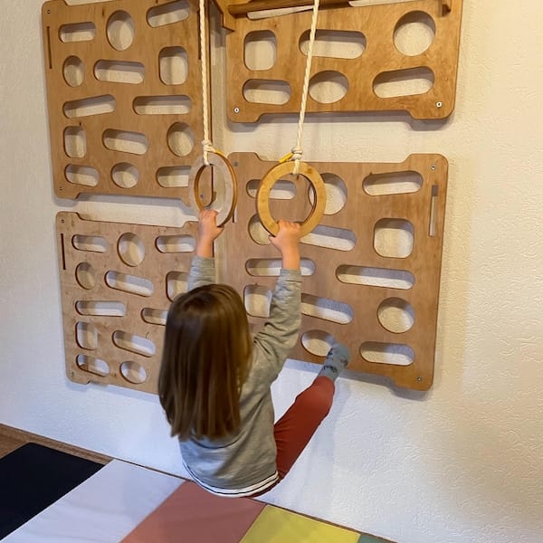 Customer photo review of Montessori Climbing Wall for Kids – Ages 2–10 with Slide, Pull-Up Bar & Rings | Wooden Indoor Playground