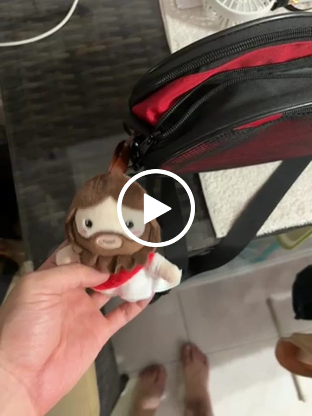 Customer video review of Mini Jesus Plush Bag Charm