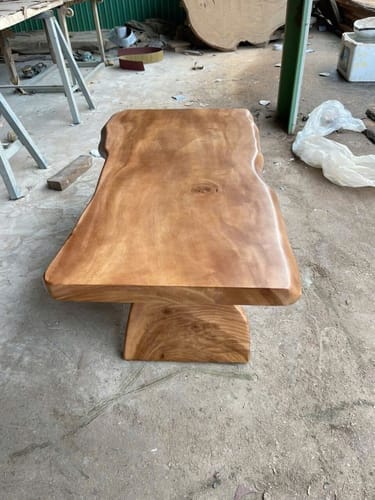 Customer photo review of Unique Solid Wood Coffee Table with Artistic Design and Natural Finish