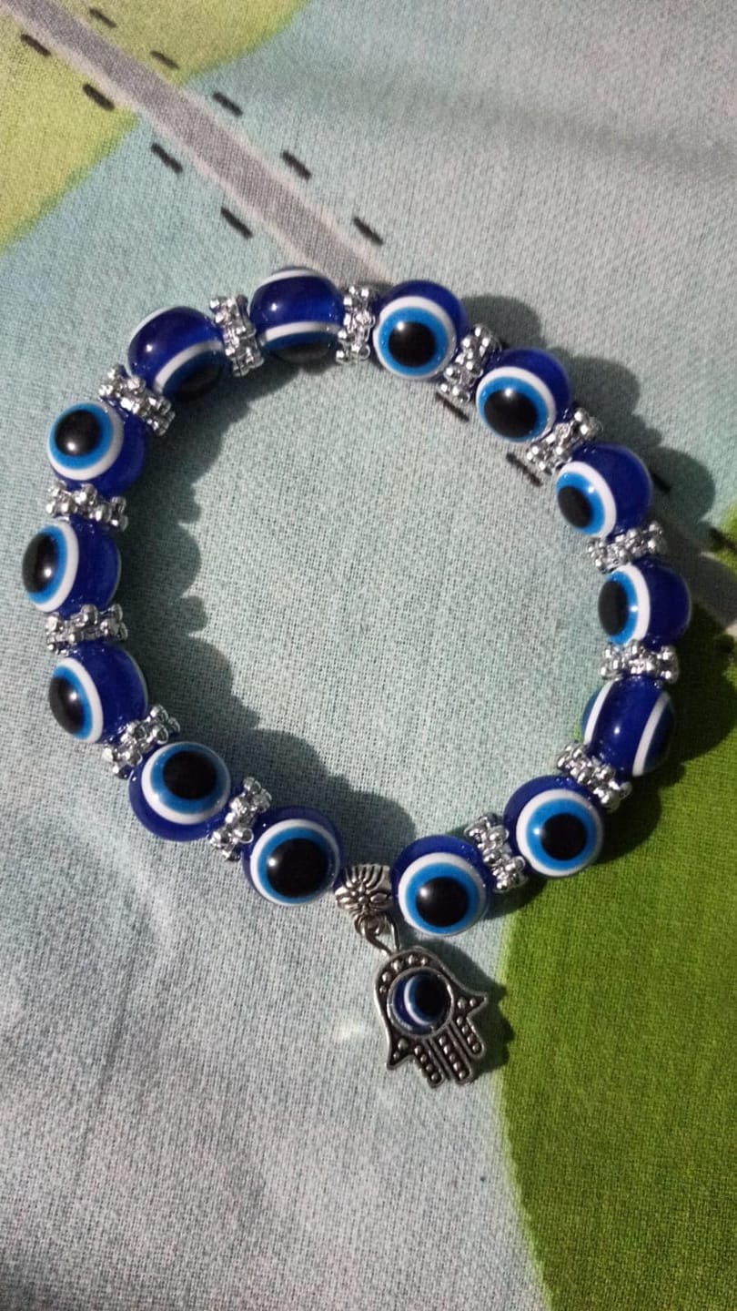 Customer photo review of FuAttract Protection Luck & Balance Hamsa Hand Evil Eye Charm Spiritual Bracelet