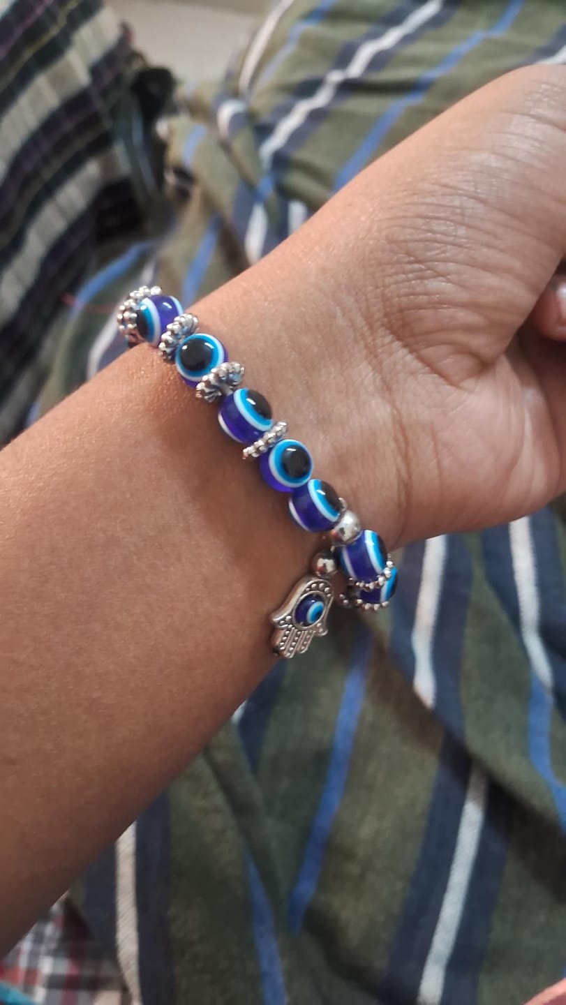 Customer photo review of FuAttract Protection Luck & Balance Hamsa Hand Evil Eye Charm Spiritual Bracelet