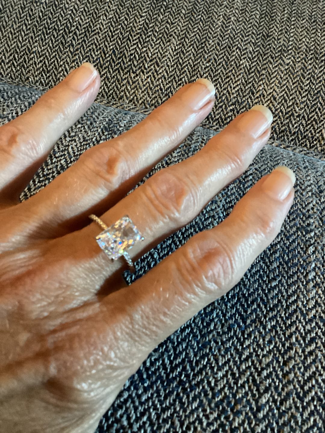 Customer photo review of Hidden Halo Radiant Cut White Sapphire Side Stone Pave Sterling Silver Ring