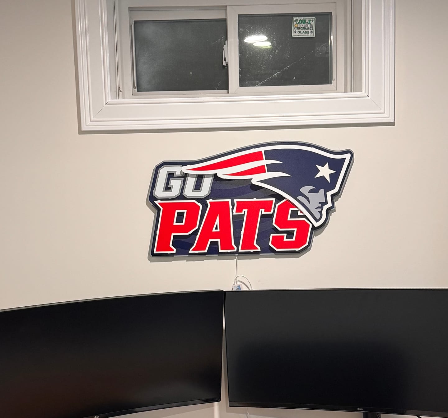 Customer photo review of New England Patriots - Hex Head EXCLUSIVE "Go Pats" Wordmark 3D Metal Wall Art