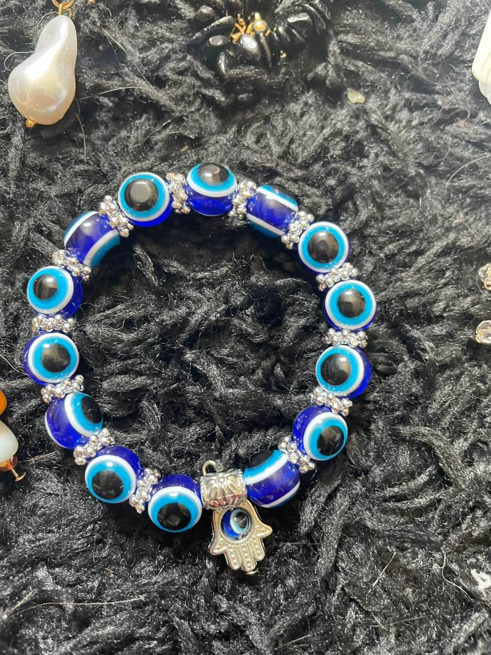Customer photo review of FuAttract Protection Luck & Balance Hamsa Hand Evil Eye Charm Spiritual Bracelet